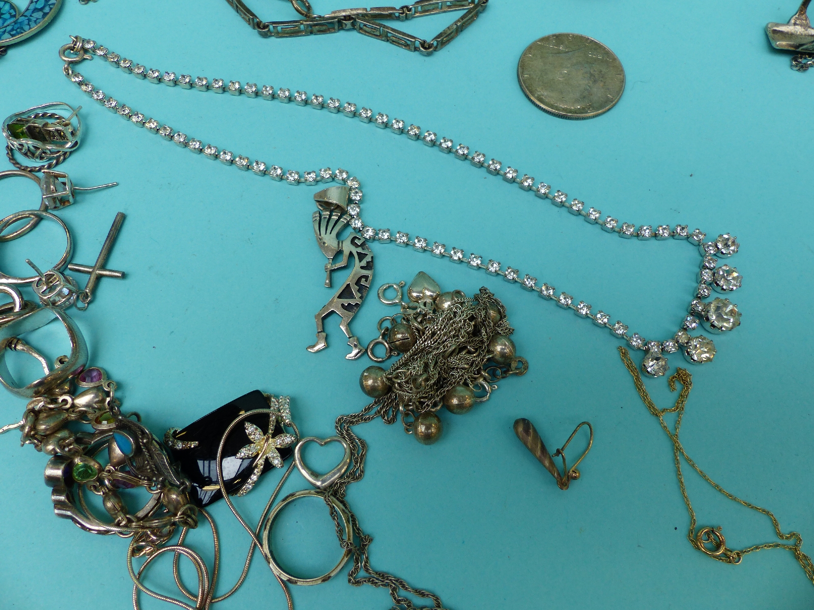A collection of silver jewellery to include necklaces, bracelets, earrings, rings, marcasite brooch, - Image 16 of 17