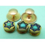 Two 15ct gold studs and three yellow metal studs each set with a turquoise cabochon