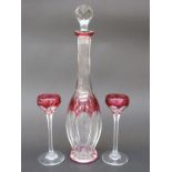 Flash overlaid cut glass cordial set with cranberry staining over clear ground,