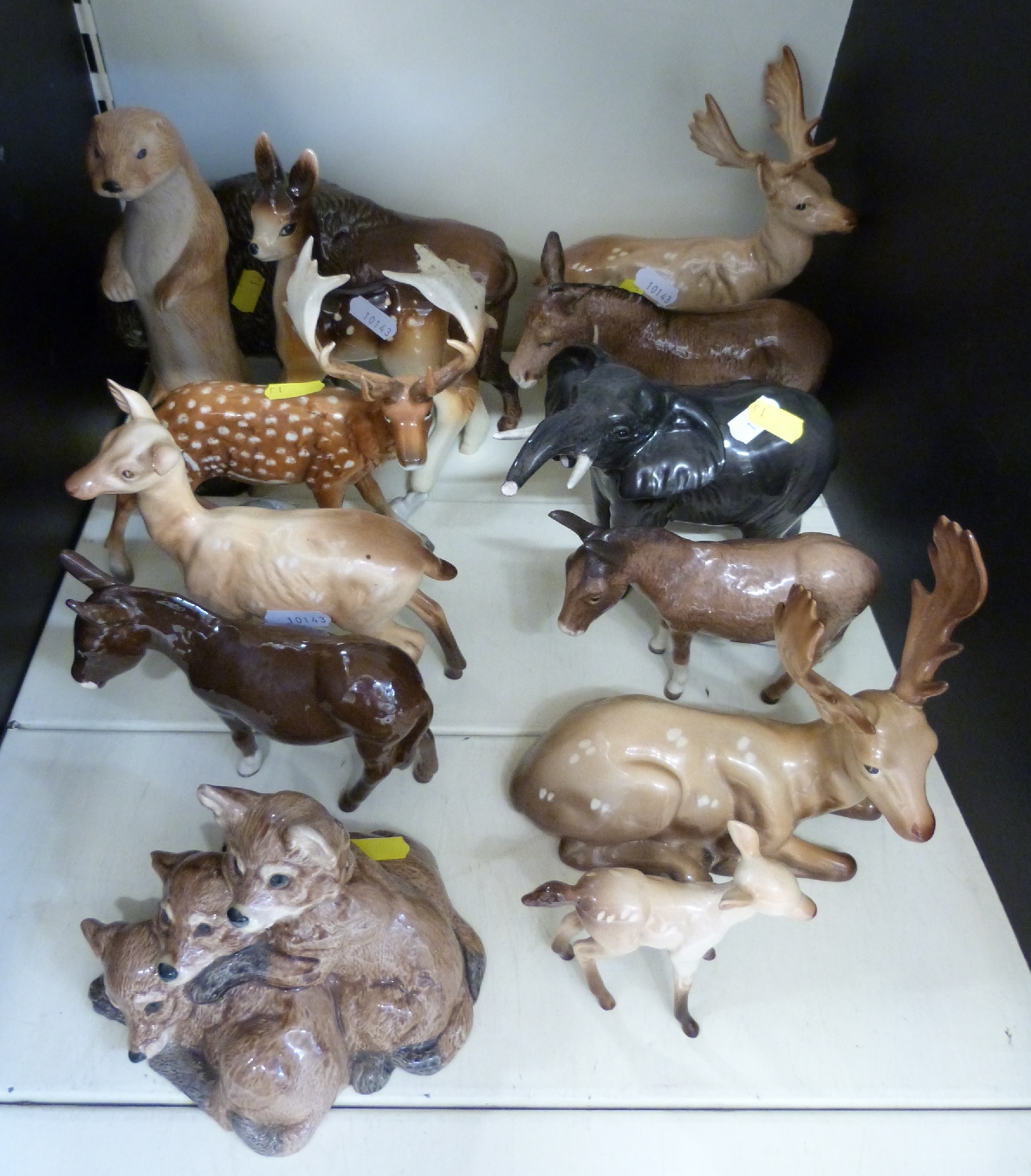 A collection of Beswick, Goebel and other models inc deer, donkeys, bison,