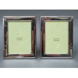 A pair of modern boxed hallmarked silver Mappin and Webb photograph frames to suit 6 x 4 inch