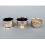 Three various hallmarked silver salts two with blue glass liners,