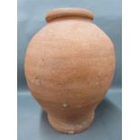 A large antique terracotta jar, 18th/19thC possibly much earlier,