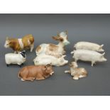 Three Beswick pigs, Beswick sheep, boxed Goebel cow,