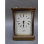 Mappin & Webb French brass corniche style case carriage clock with enamelled Roman dial,