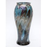 An iridescent glass vase,