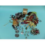 A collection of costume jewellery including silver brooch, beads, Wedgwood brooch,