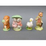 Four Royal Albert figures comprising Squirrel Nutkin, Mr Toad,