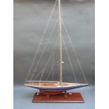 A model sailing yacht on stand,