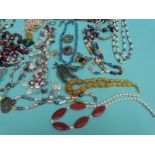 A collection of necklaces to include pearls, agate and pearl, tigers eye and pearl,