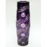 An amethyst flash overlaid cut glass vase of double tapering form, 30.