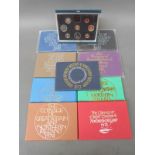 Nine Royal Mint Coinage of Great Britain and Northern Ireland sets including commemorative examples