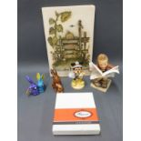 Four Goebel Hummel figures including boy reading newspaper, Mickey Mouse and unusual rabbits,