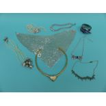A collection of costume jewellery including an enamel and silver diamante necklace