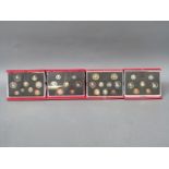 Four Royal Mint deluxe cased coin collections comprising 1988, 1989,