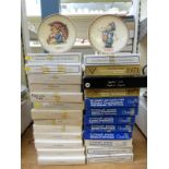 A consecutive run of 25 boxed Goebel Hummel annual plates,