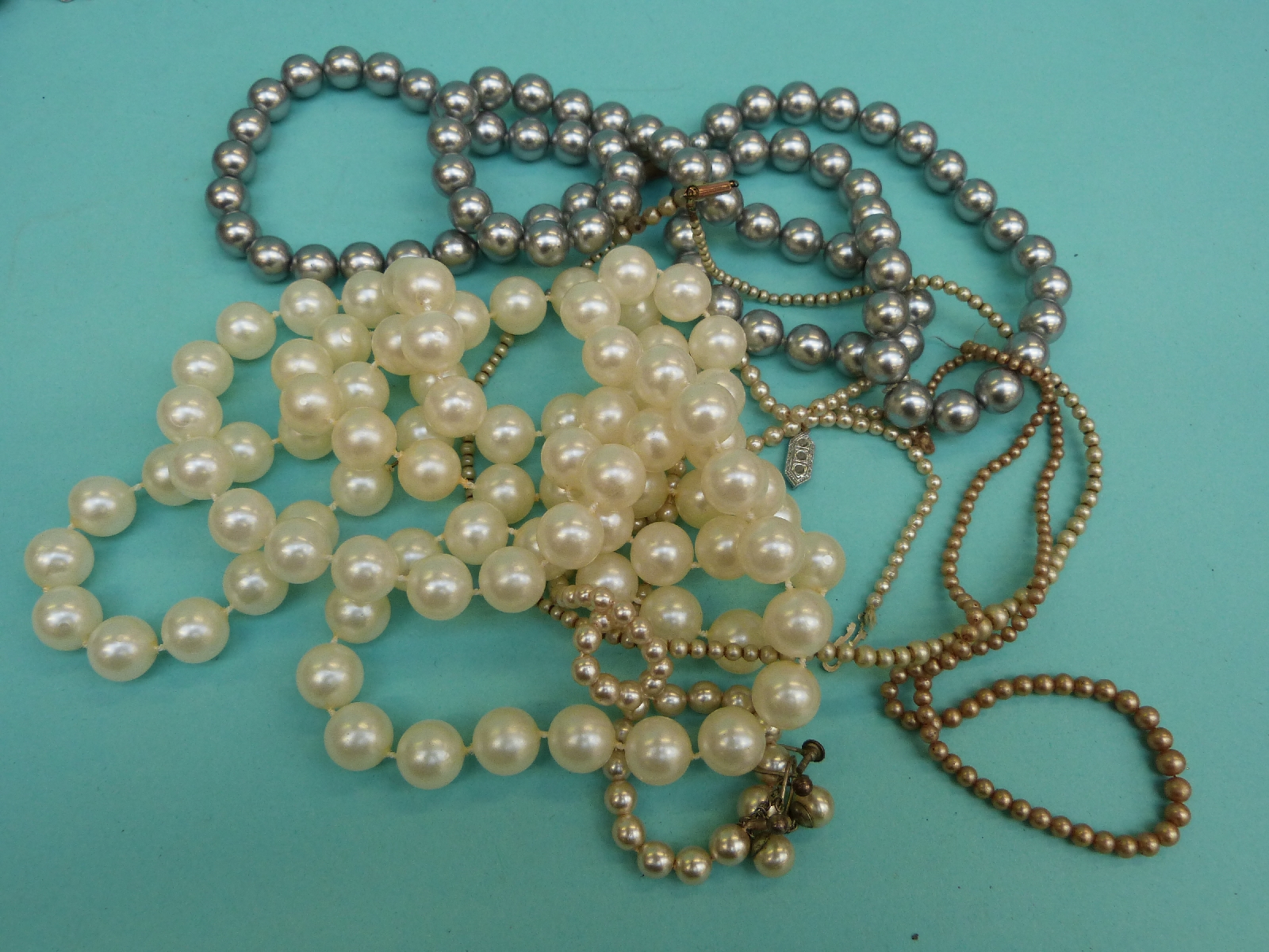 A collection of beaded necklaces to include glass beads, - Image 4 of 7