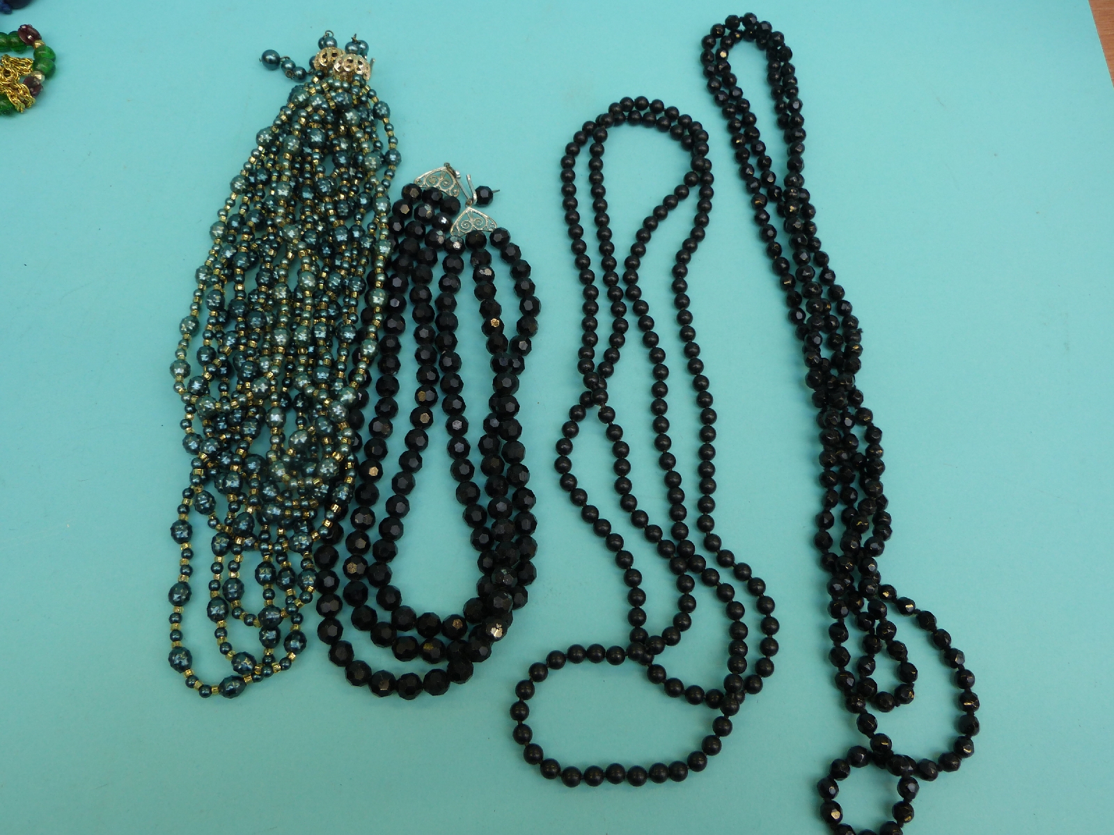 A collection of beaded necklaces to include glass beads, - Image 5 of 7