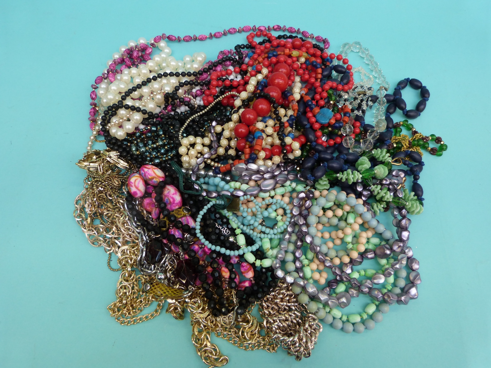 A collection of beaded necklaces to include glass beads, - Image 2 of 7