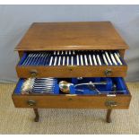 Walker & Hall twelve place setting canteen of cutlery in mahogany two drawer table