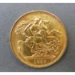 An 1887 gold double sovereign