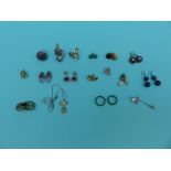 Three silver rings, silver earrings including amethyst set, sapphire earrings,