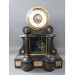 A late 19thC two train slate mantel clock in drum style case,