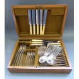An oak cased Mappin & Webb six-place setting canteen of cutlery with some extra pieces
