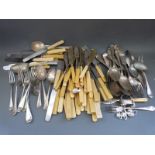 A quantity of silver plated cutlery including rat tail and fiddle pattern knives etc and a