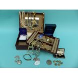 A collection of costume jewellery including two silver lockets, watches,