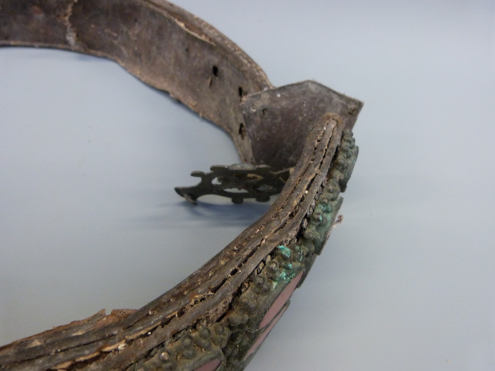 An 18thC/19thC lndo Persian wide leather belt with white metal engraved decoration set with - Image 3 of 4