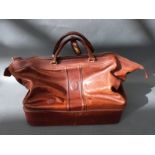 A tan leather rectangular travel bag marked Ceancarel, approx. 50cm long.