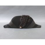 A late 18th/early 19thC man's silk bicorn hat, with braided silk trim, lined,