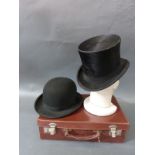 Two hats to include a black silk top hat by Garlick & Sons Bristol, internal size approx. 20cm x15.