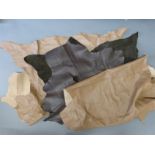 Three leather hides,