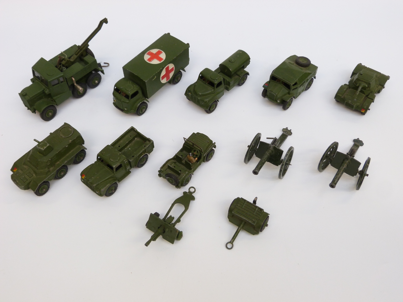Ten Dinky Toys and Supertoys diecast model military vehicles including Military Ambulance,