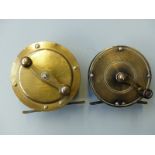 Two brass fishing reels,