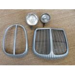 Two Daimler radiator grilles and two spotlights