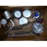 A quantity of pressure gauges, motoring items,