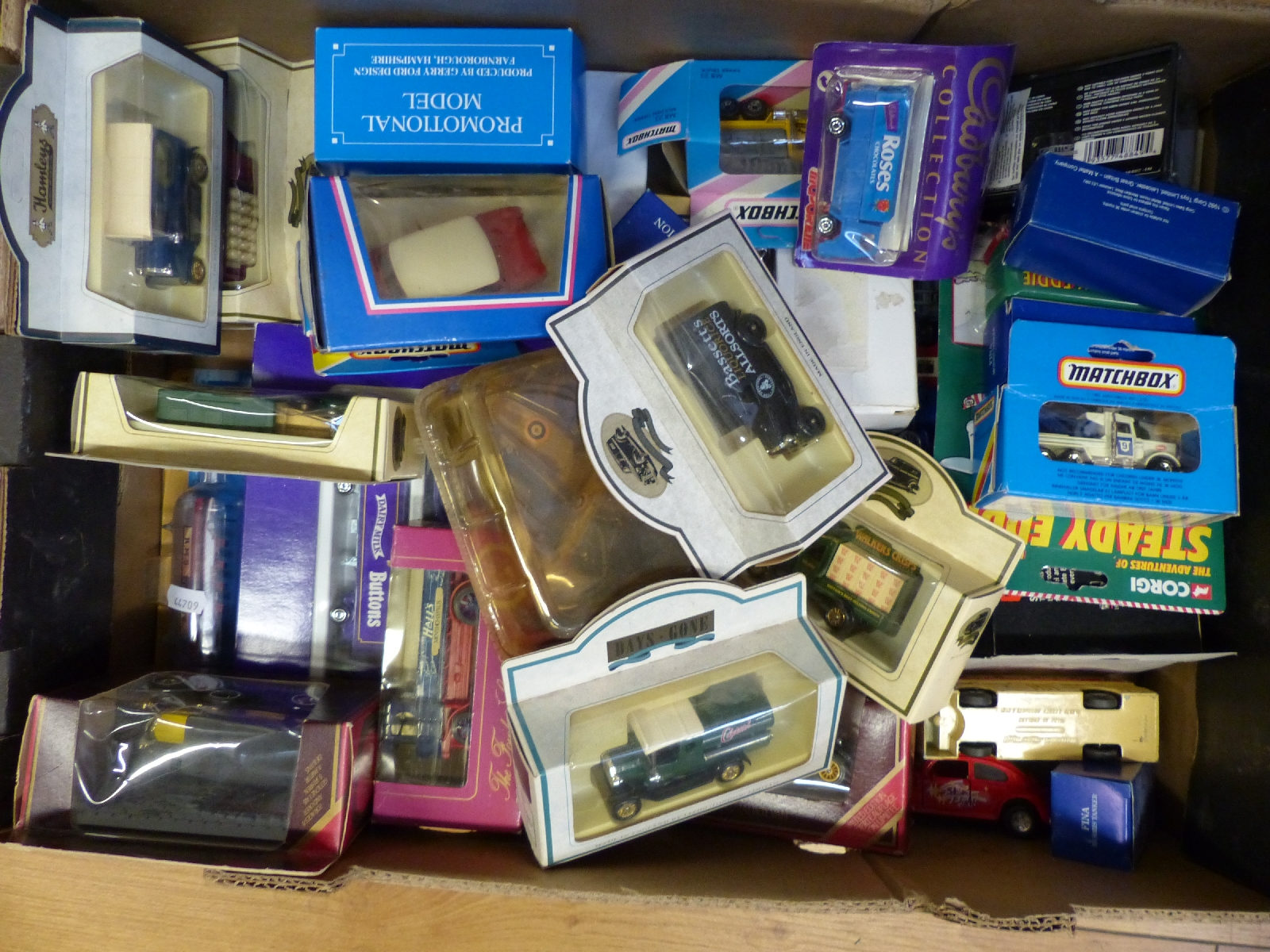 Over forty Corgi, Matchbox, Majorette and similar diecast model vehicles, some in original boxes.
