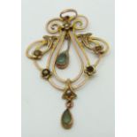 A 9ct gold Edwardian pendant set with seed pearls and topaz, 2.