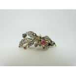 A Victorian brooch set with old cut and rose cut diamonds,