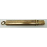 A 9ct gold pencil holder, 9.