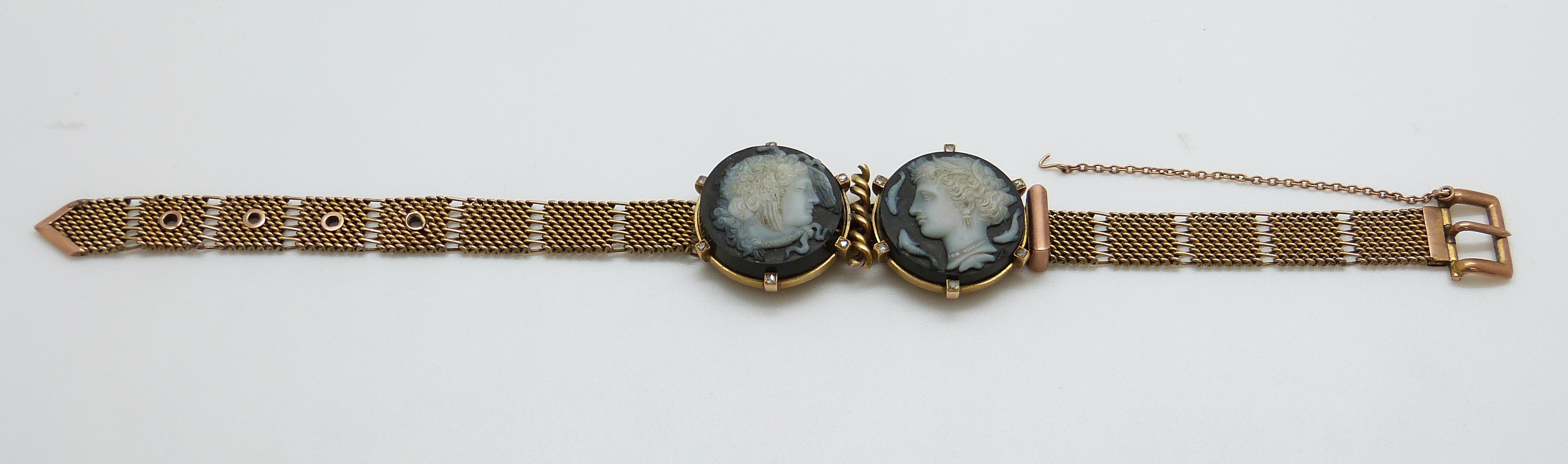 A 9ct gold Victorian bracelet set with two finely carved hardstone cameos depicting day and night,