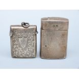 An Edward VII hallmarked silver vesta, Birmingham 1907 and a similar size container,