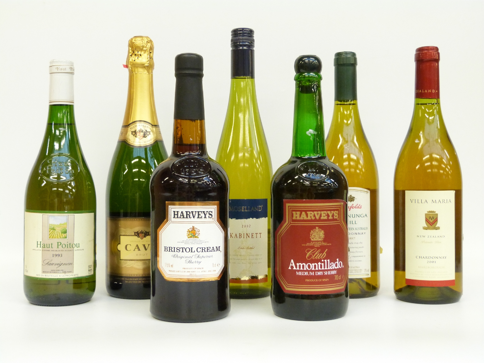 Seven bottles of wine and sherry including Penfolds Koonunga Hill 1997 Chardonnay,