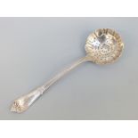 A Tiffany & Co white metal sifter or strainer spoon, stamped Tiffany & Co sterling,