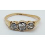 An 18ct gold Victorian ring set with three old cut diamonds (size M)