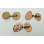 A pair of 9ct gold cuffinks with foliate design and another cufflink (7.