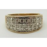 A 9ct gold ring set with diamonds in three rows, total diamond weight approximately 0.5ct, 2.